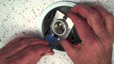 unhooking junction box from recessed fixture|recessed light fixture removal.